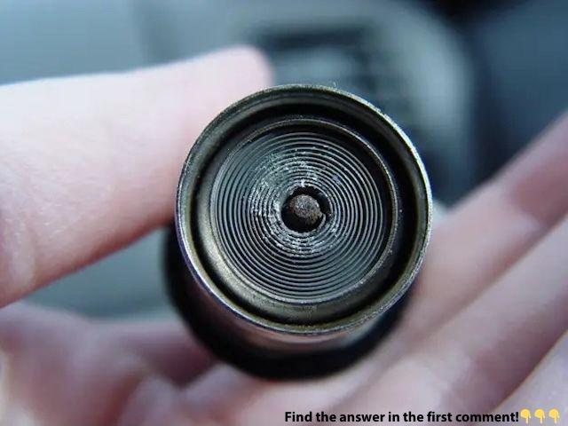 A close-up look at the glowing vintage car cigarette lighter coil, ready to ignite a cigarette in seconds